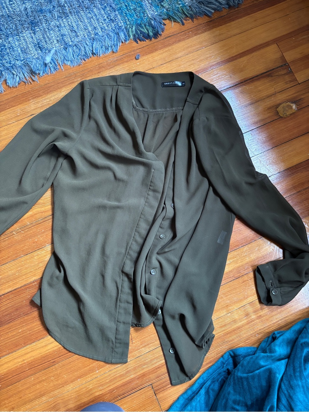 Green button up top lightly worn but in great shape